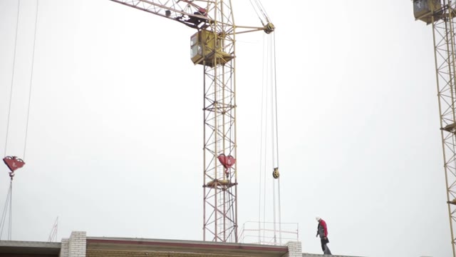 View Of The Construction Site And Cranes.