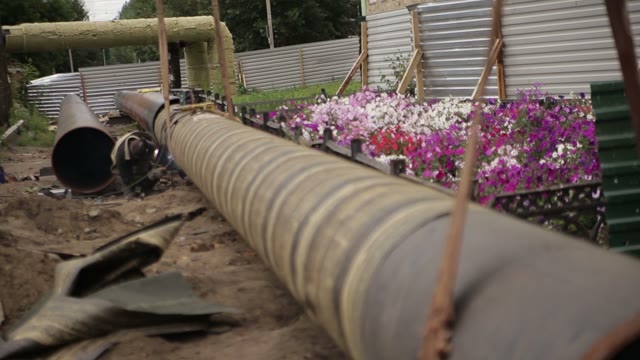 Man Working With Welding At The Site. Repair Pipes.