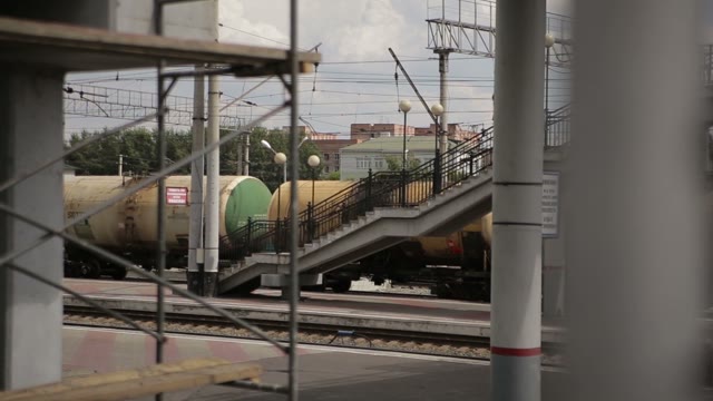 Freight Train Travels Through The Train Station.