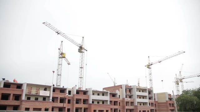 House Under Construction, A Lot Of Cranes.