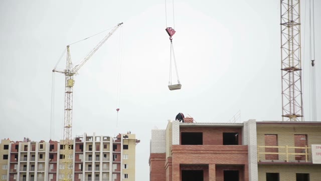 Construction Of The House. Crane Works.