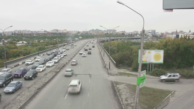 City Traffic. View Of The Bridge. Timelapse.