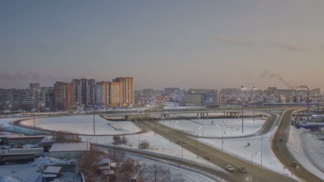 Urban Traffic, View Of The Road Bridge. Evening. Winter. Timelapse.