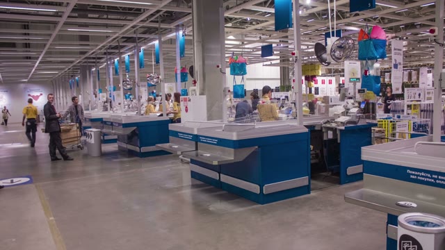 Construction Hypermarket. People At The Checkout. Timelapse.