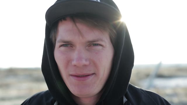 Man Looks Into The Distance. Face Close