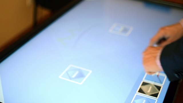 Man Interacts With A Modern Touch Computer. Close-up