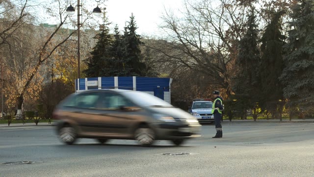 Traffic Police Officers Standing On The Road