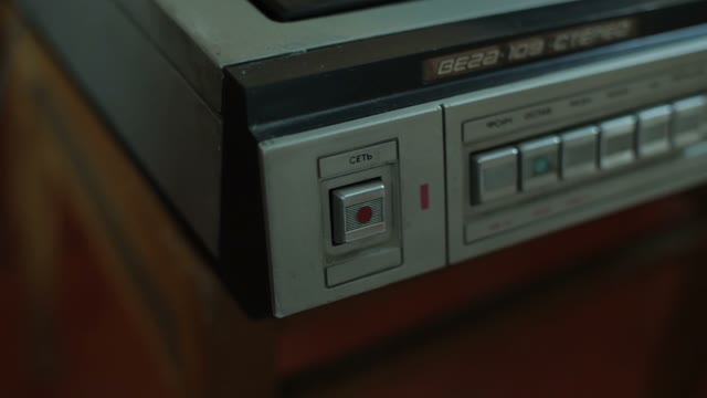She Presses The Button. Close-up