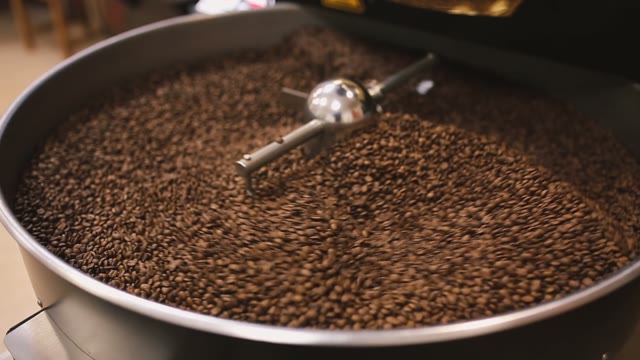 Roasting Coffee In The Coffee Machine. Close-up