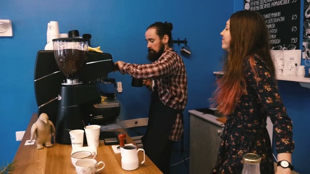 Barista Shows How To Operate The Coffee Machine. Slow Motion