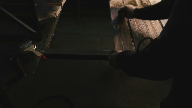 Carpenter Is Engaged In Wood Processing. Close-up