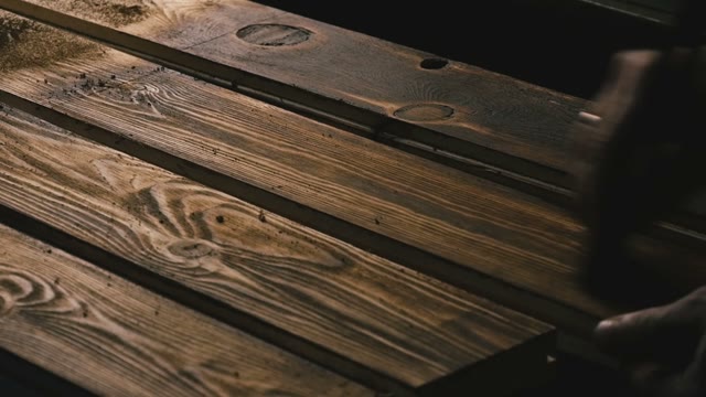 Man Working With Wood. Close-up