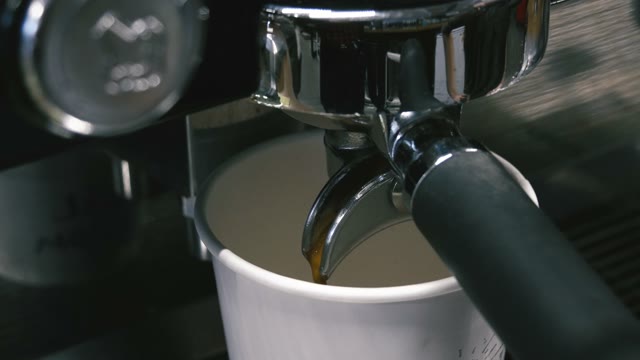 Coffee Machine Pouring Coffee Close Up