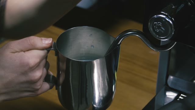 Preparing The Coffee Creamer. Close-up