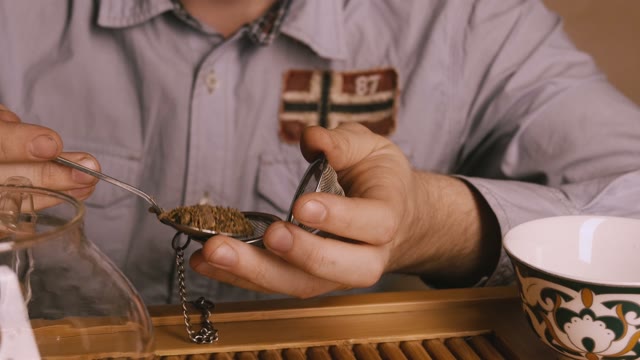 The Man Is Going To Make The Tea. Close-up