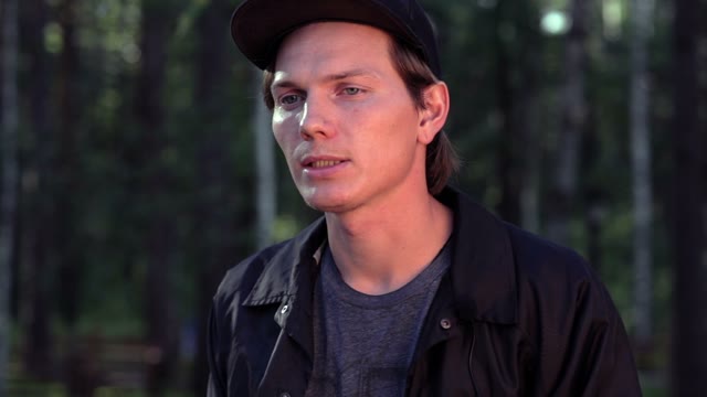 Young Man Says To The Camera