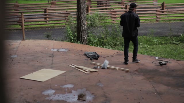 Man Prepares Power Tools