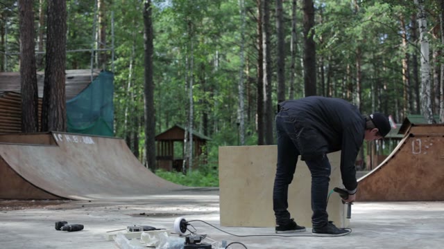 Carpenter Finishes Polish Goods From Wood