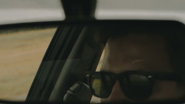 Man Drives A Car Close-up