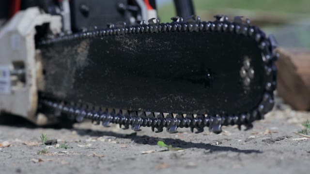 Chainsaw On The Ground Close-up