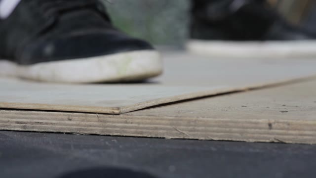 Man Draws A Line On A Wooden Board Close-up