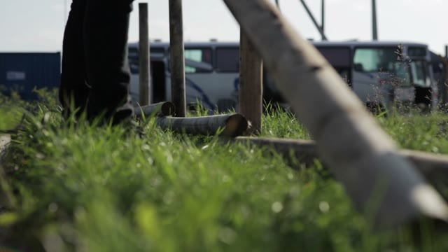 Man Takes A Log And Puts Drill