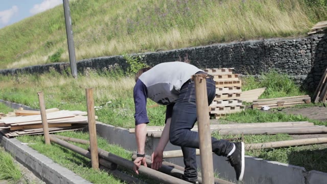Man Preparing To Tighten The Screw