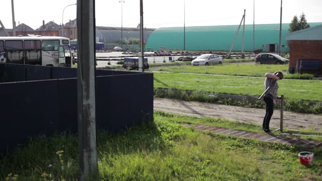 Man Hammers In Stake In The Ground