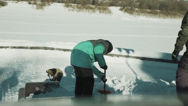 Men Digging Snow