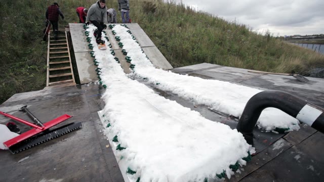 Snowboarder Does The Trick
