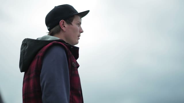 The Guy Makes A Trick On A Snowboard