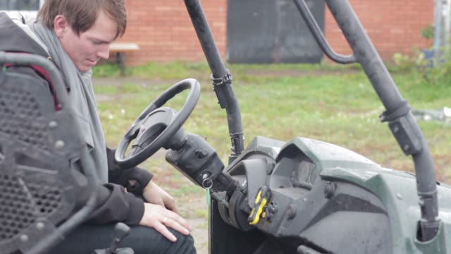 The Guy Sitting On The Quad Bike