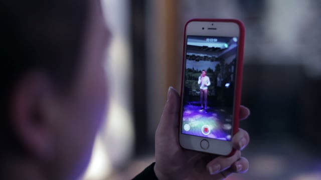 Man Take A Video Via Smartphone Camera Of A Concert Performance