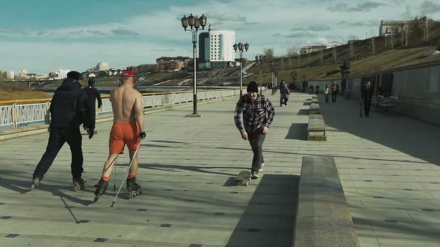 Man Riding A Roller Shirtless On The Waterfront