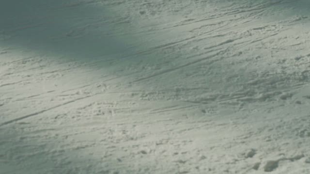 Snowboarder Slides A Figure