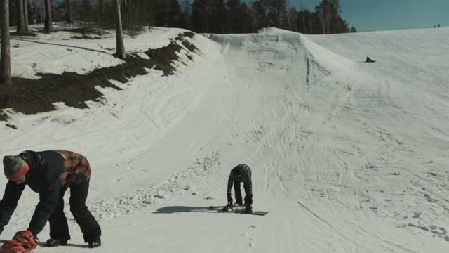 Snowboarders Are Prepared With The Help Of A Snowboard Springboard