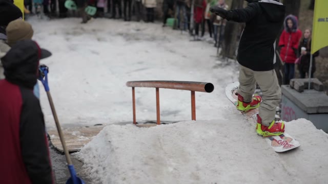 Snowboarder Does The Trick