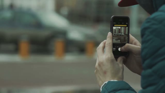 Man Makes The Photo On Your Smartphone