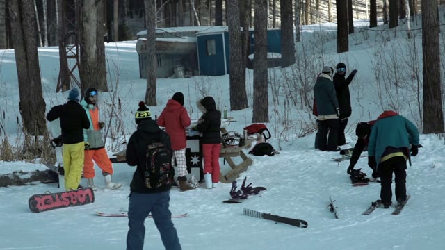 Skiers Relaxing In Nature