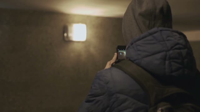 Man Takes Pictures In The Underground Passage