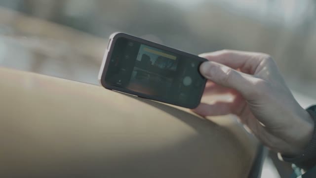 Man Makes A Photo On Smartphone Close-up