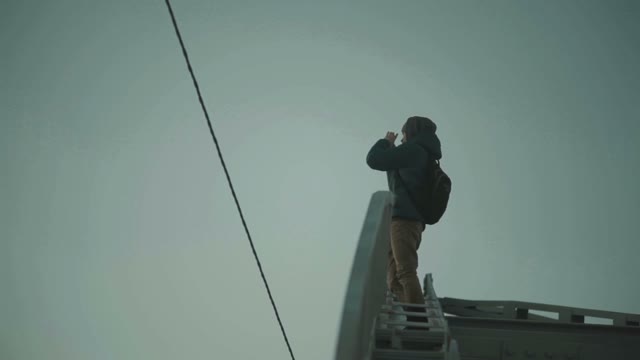 Man Takes Pictures From A Height