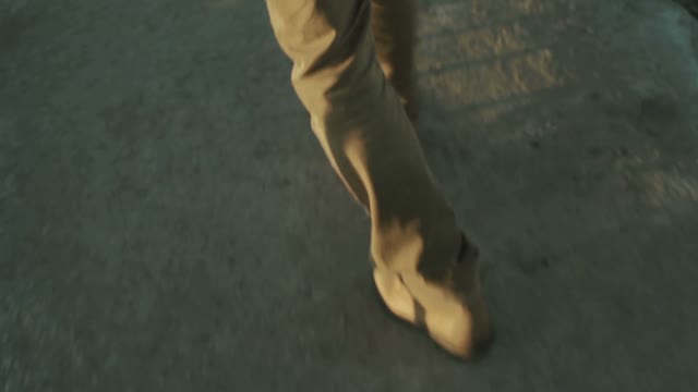 Man Walks Down Close-up Of Feet