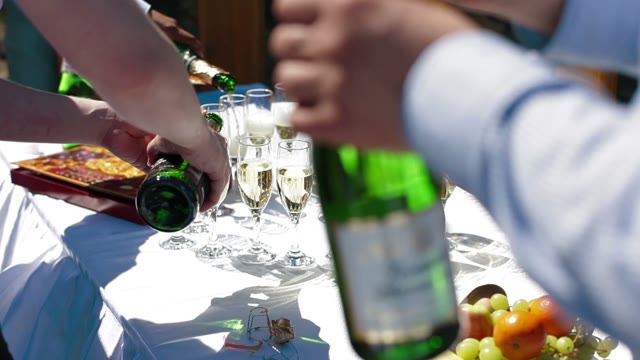 Men Poured Champagne By The Glass