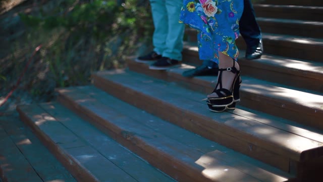 People Walking Down The Stairs Close-up Of Feet