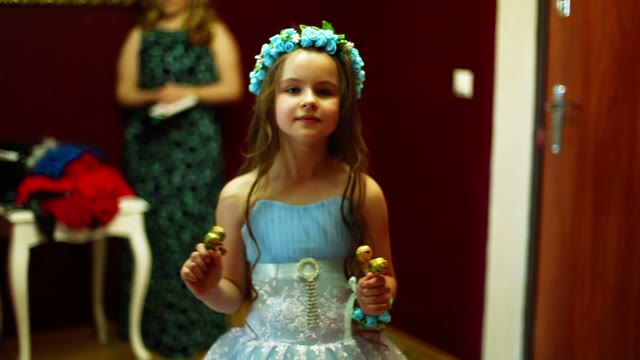 Girl Stands With Candy