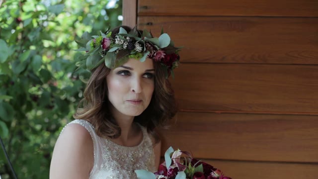 Bride With A Bouquet Speaks On Camera In The Outdoor