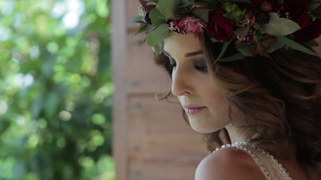 Woman Standing With A Wreath On Head Close-up