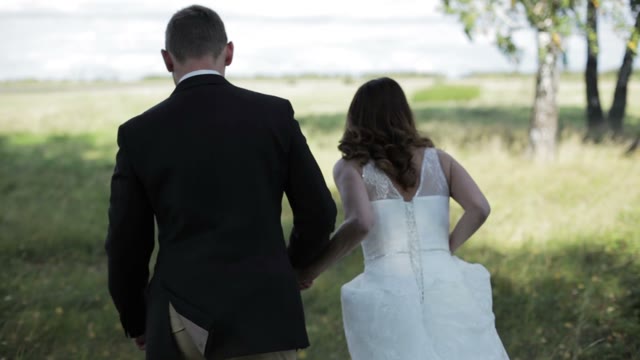 Newlyweds Running On The Field