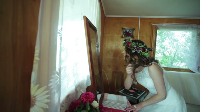 Bride Preens Before The Mirror